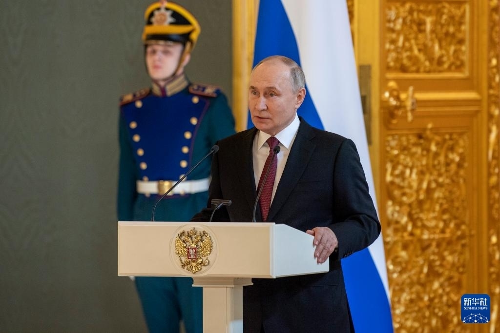 3月20日，俄羅斯總統(tǒng)普京在莫斯科克里姆林宮與其競選團(tuán)隊(duì)代表舉行見面會。新華社記者 曹陽 攝