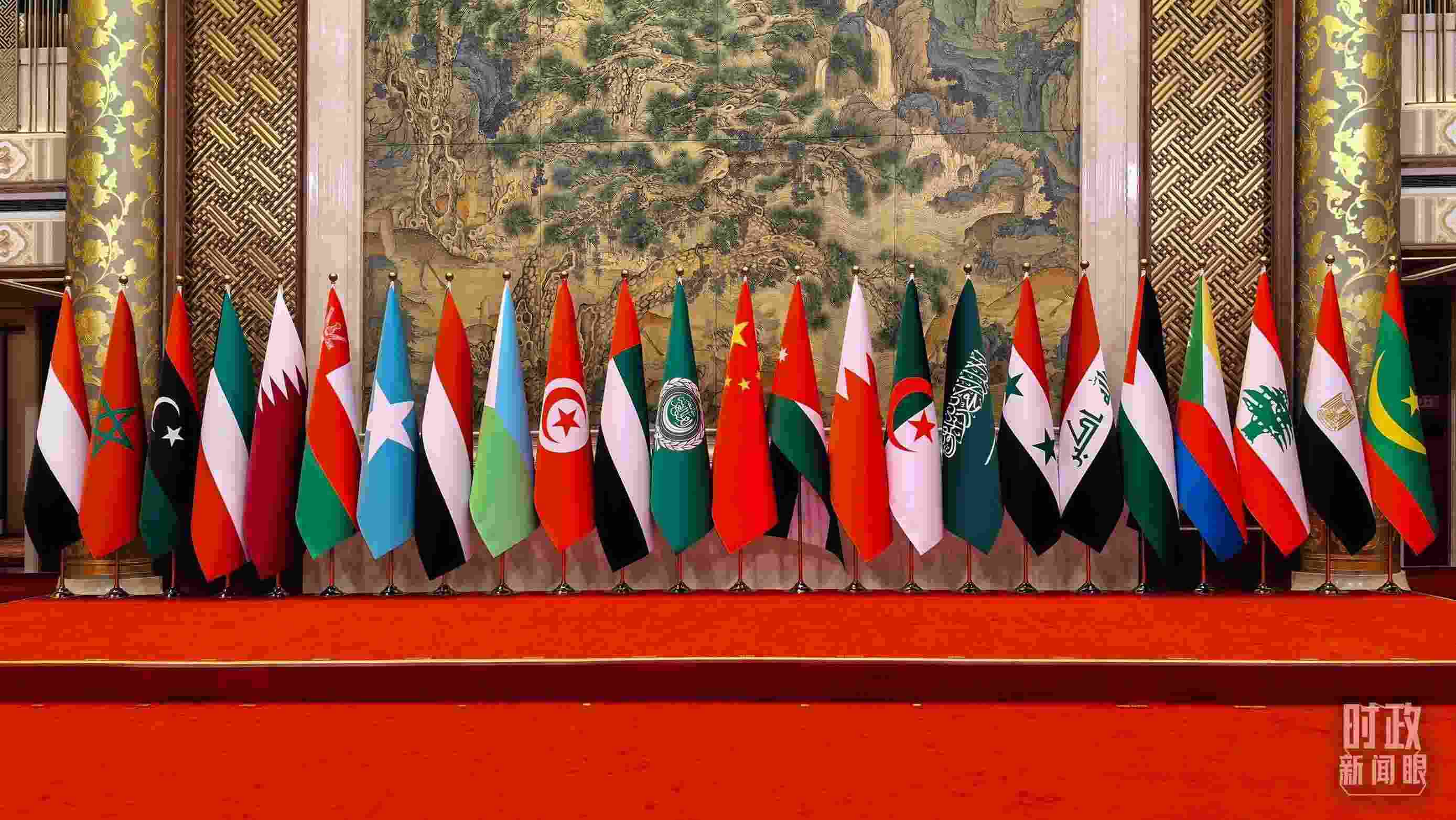 △會議現(xiàn)場的集體合影區(qū)。（總臺央廣記者潘毅拍攝）