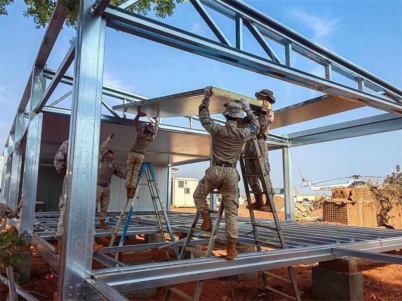 小組協(xié)同推進工程任務。鄧原淘攝